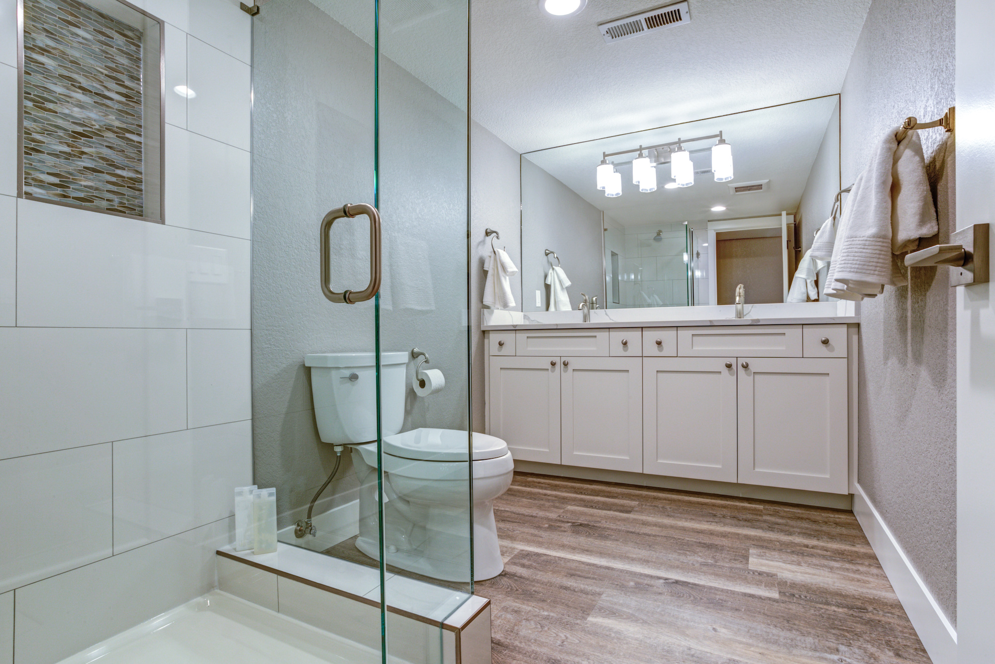 Bathroom with frameless shower doors 